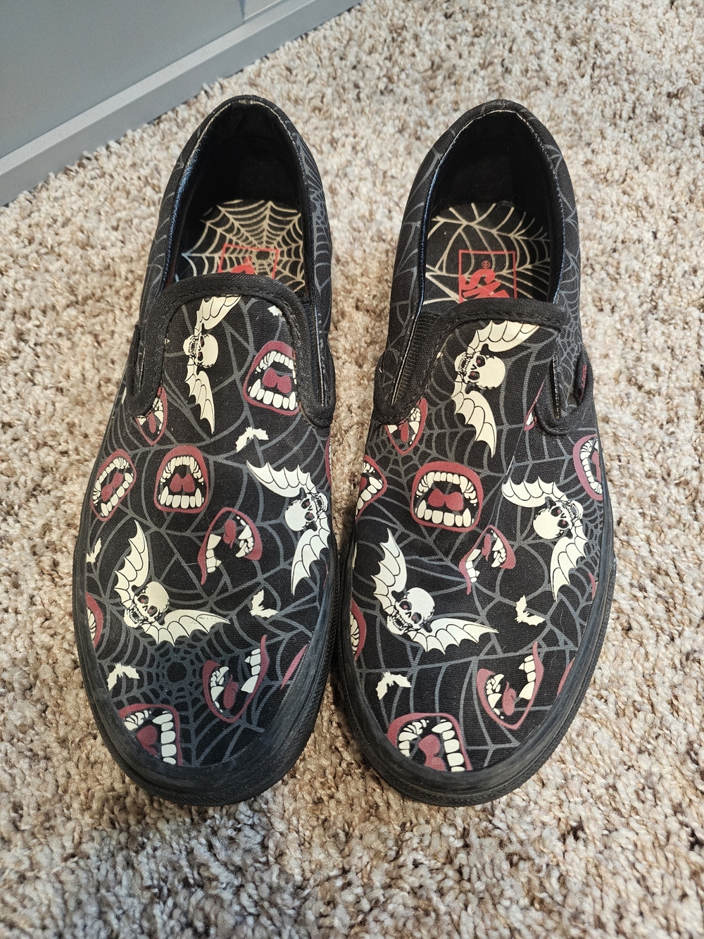 Vans Black Slip-On Sneakers with Spiderweb And Vampire Accent